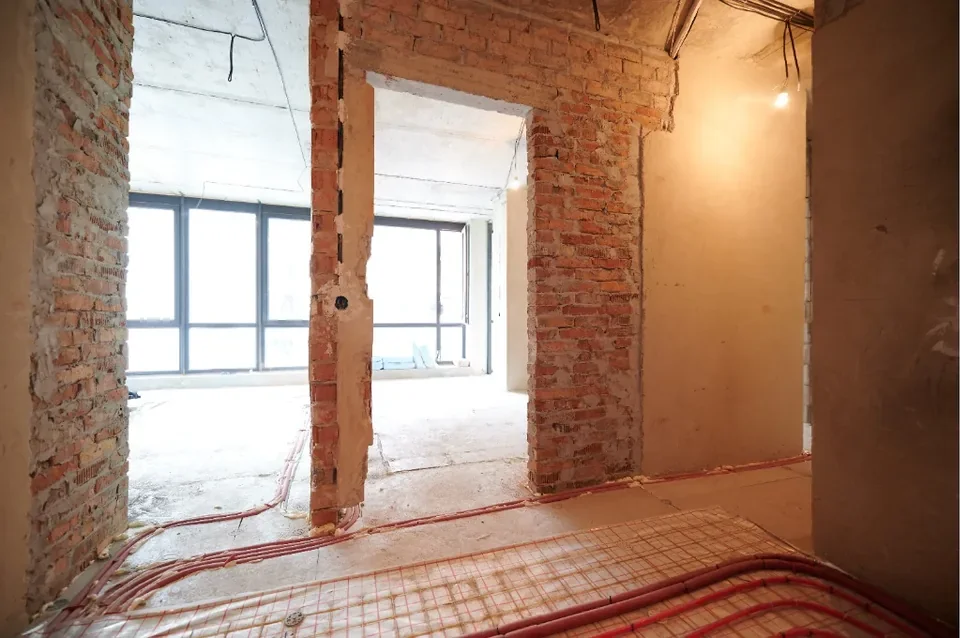Before panel showing the apartment renovation site condition and structural works