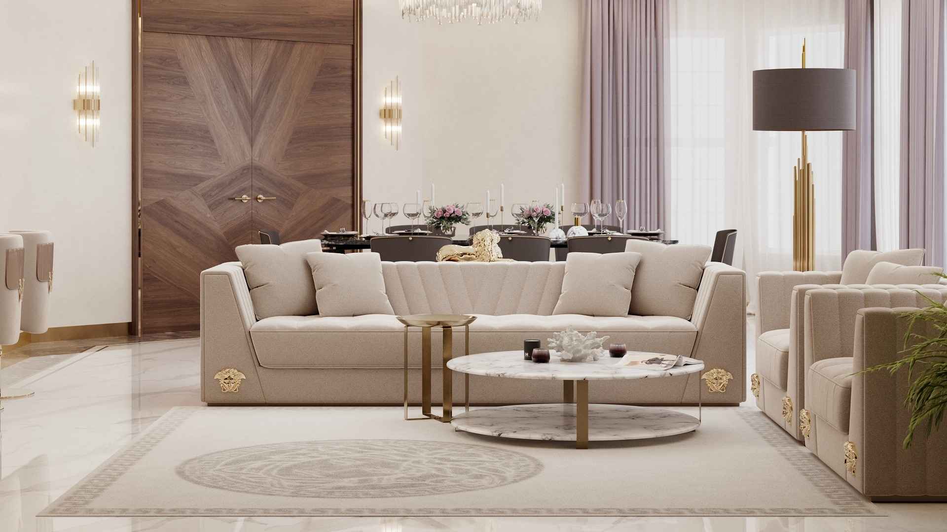 Versace apartments marble kitchen island aligned with living room and bouquet centerpiece