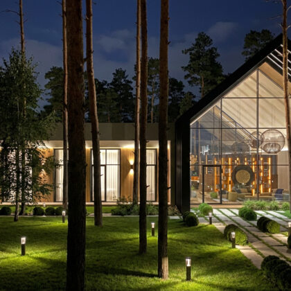 Riviera passive house in a pine forest evening exterior view